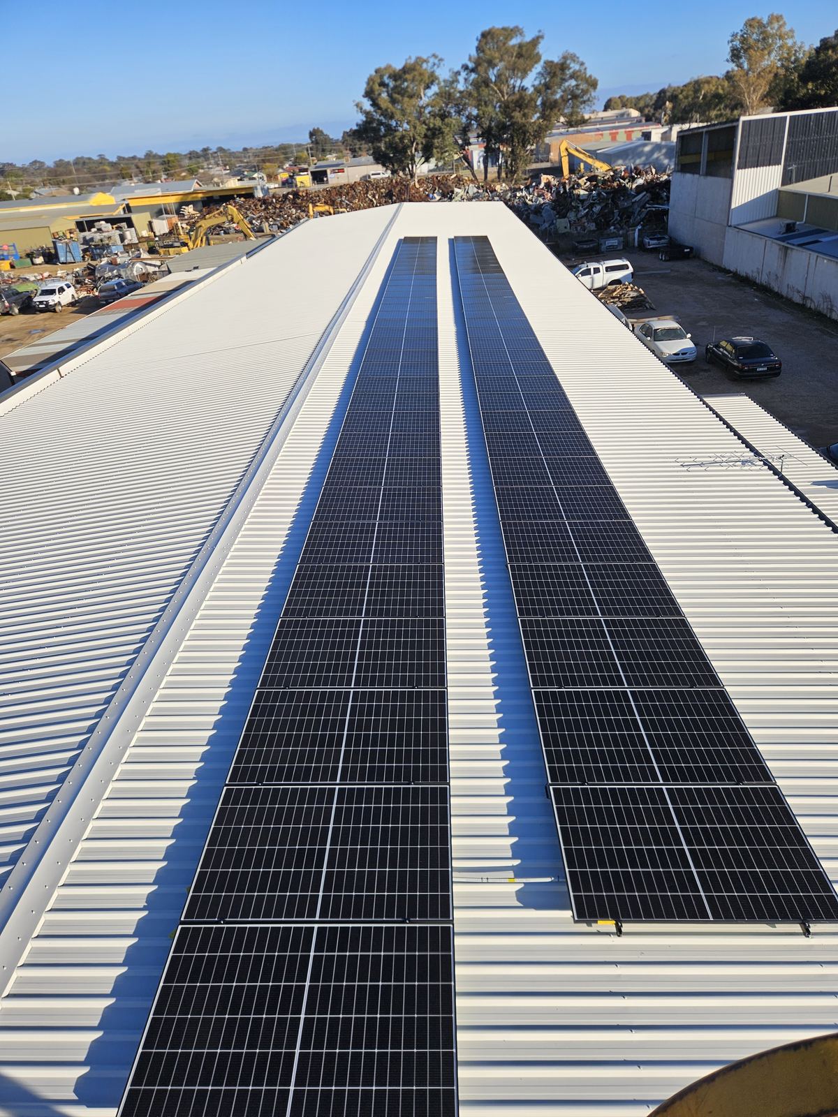 Commercial solar installation on a warehouse roof, East Suburbs